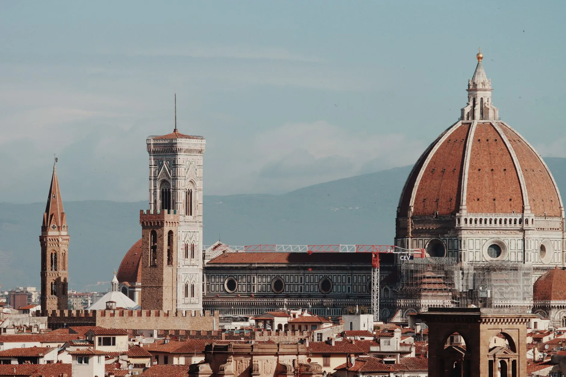 Aerial view of Florence with the Duomo and bell tower under a clear sky